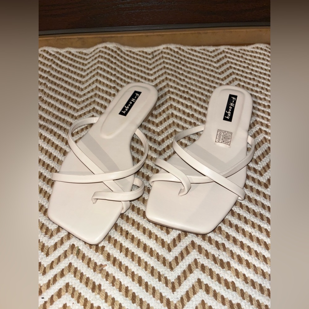 Minimalist strappy creamy colored sandals in like new condition size 38